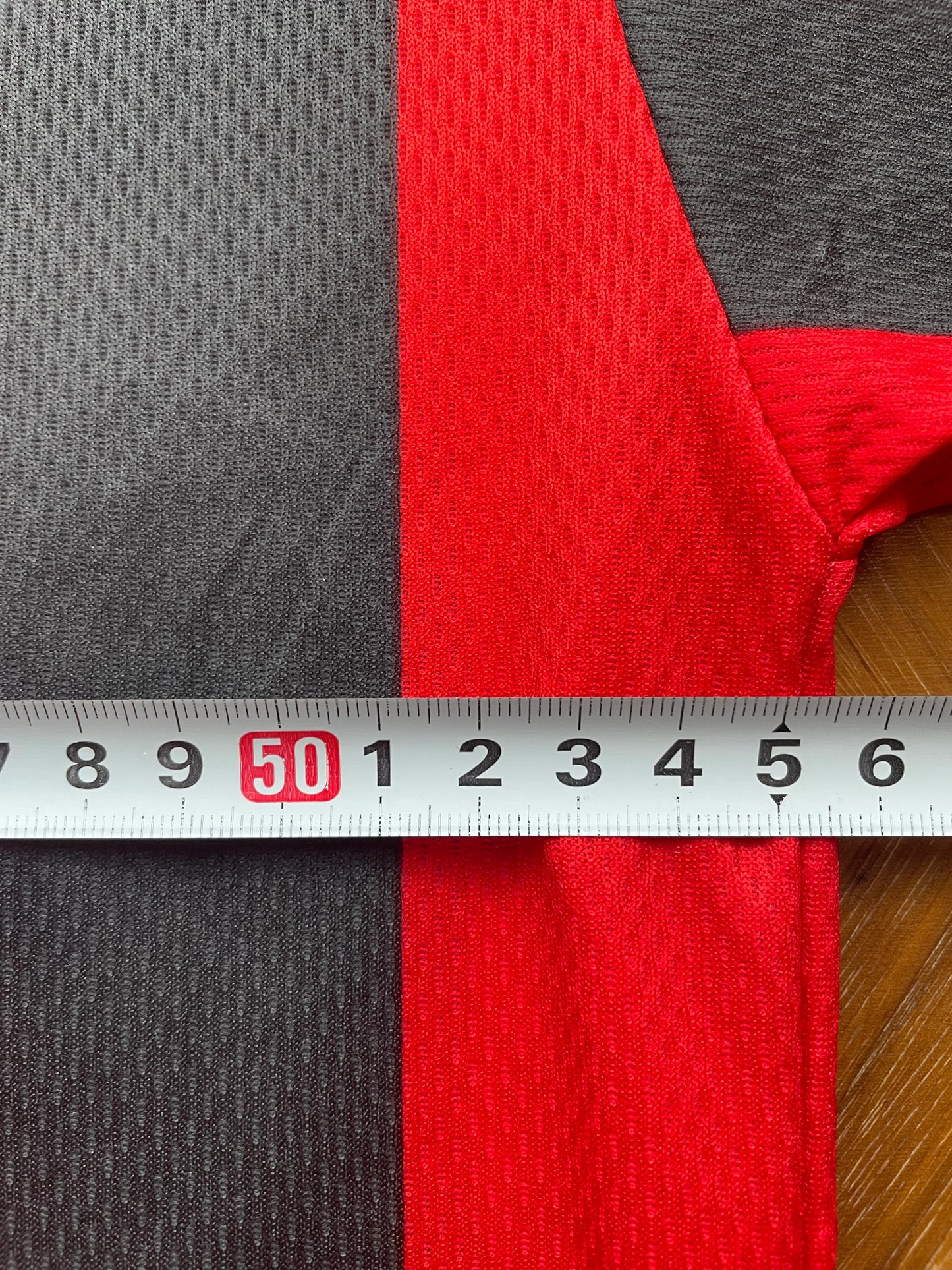 Red and black striped AC Milan 1996-97 Home jersey with 'VIERCHOWOD' and number '29' on a beige background