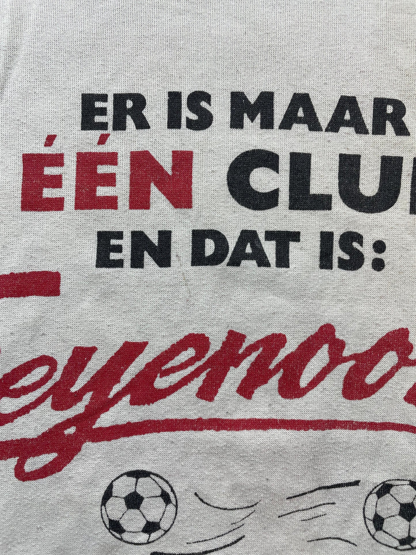  showing the back with a large vintage-style circular graphic. The design features a yellow 'F' with a bulldog mascot inside a red and white circle