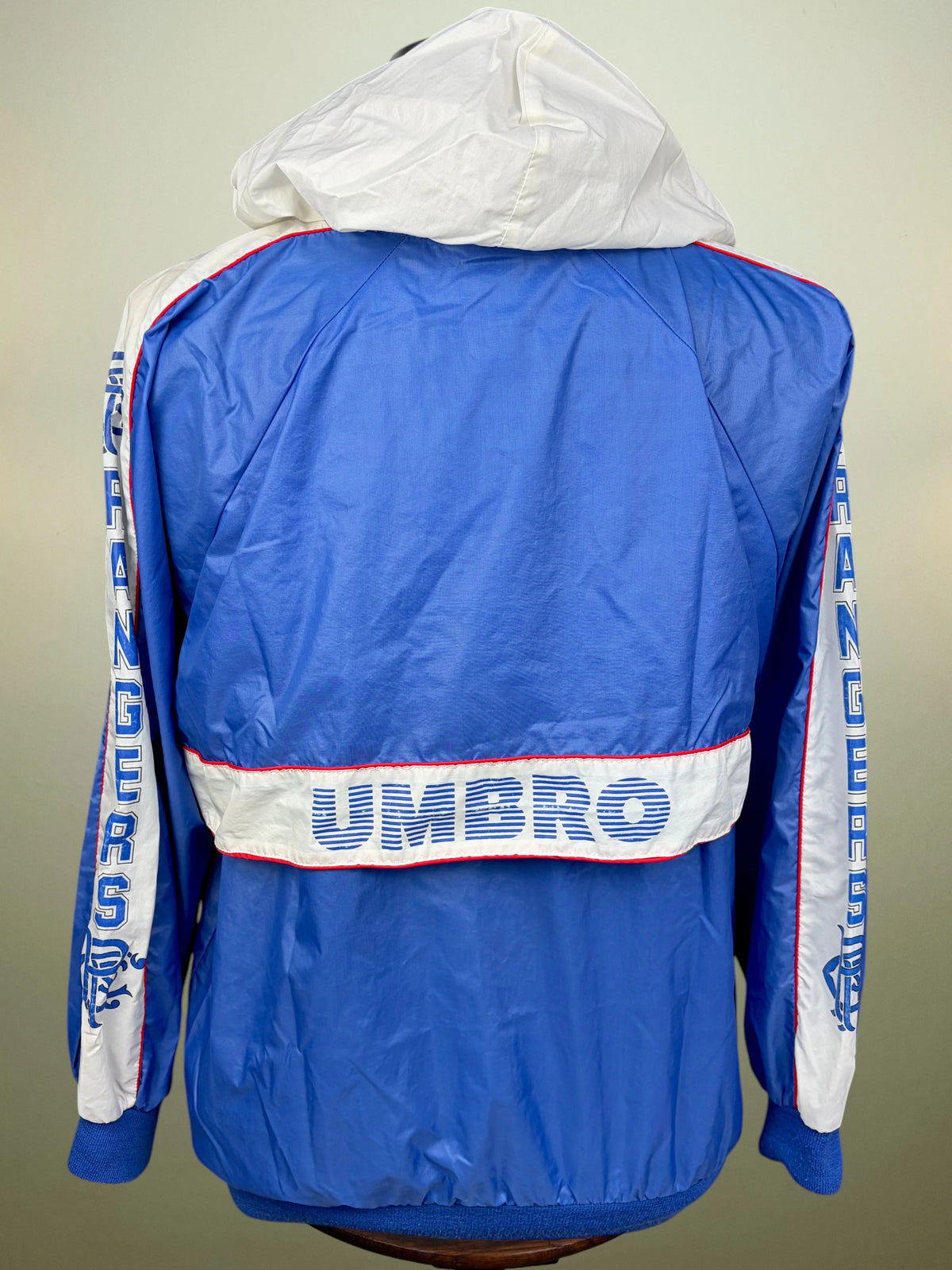  stylized white script across the back