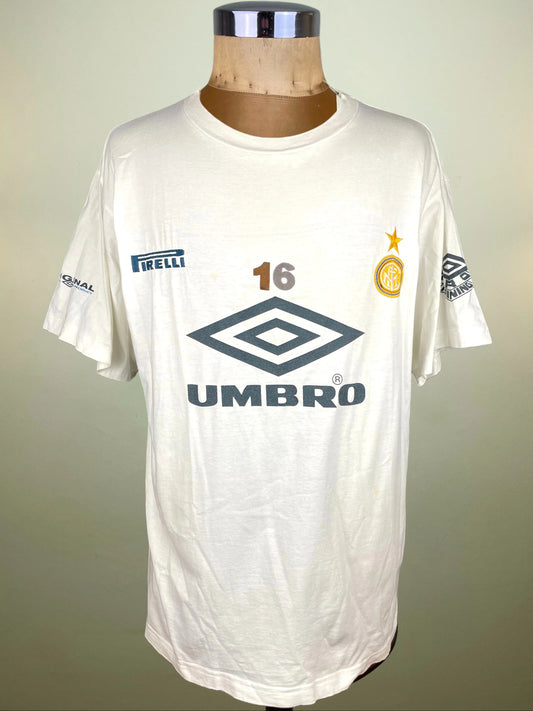 White sports jersey with various logos on a mannequin against a plain background