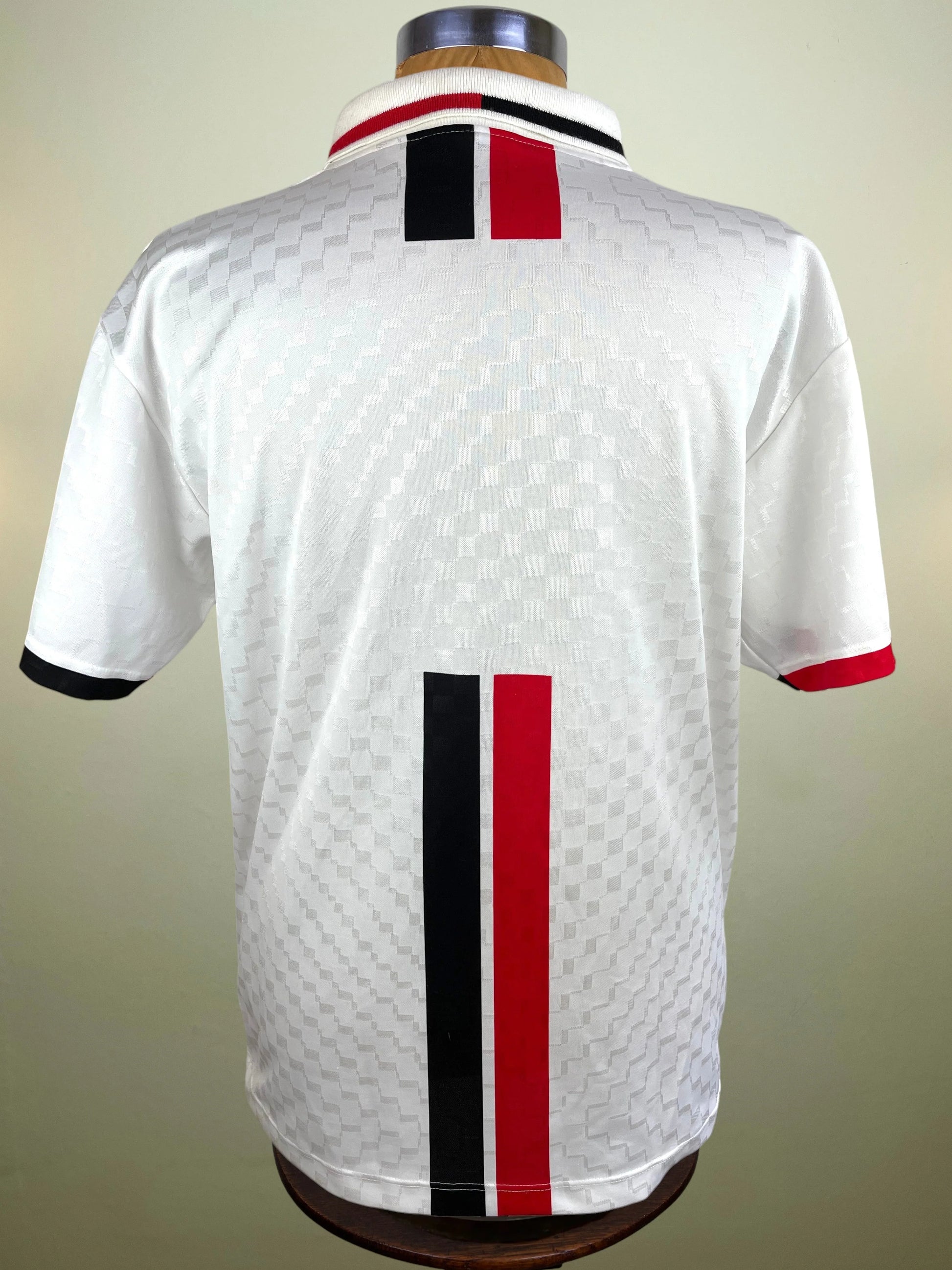  featuring a white textured pattern with red and black vertical stripes