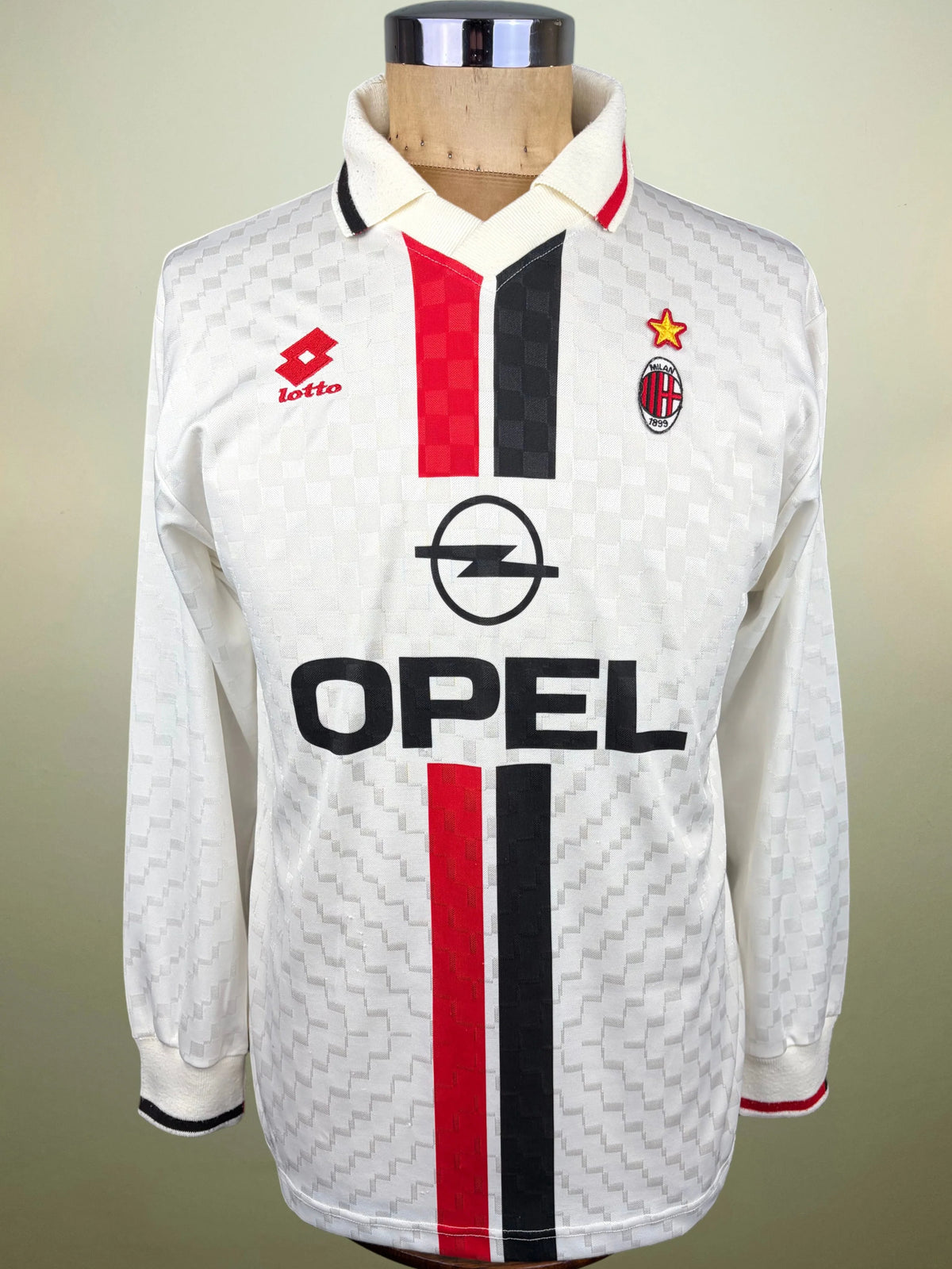 A vintage 1995-1996 AC Milan long-sleeve soccer jersey by Lotto