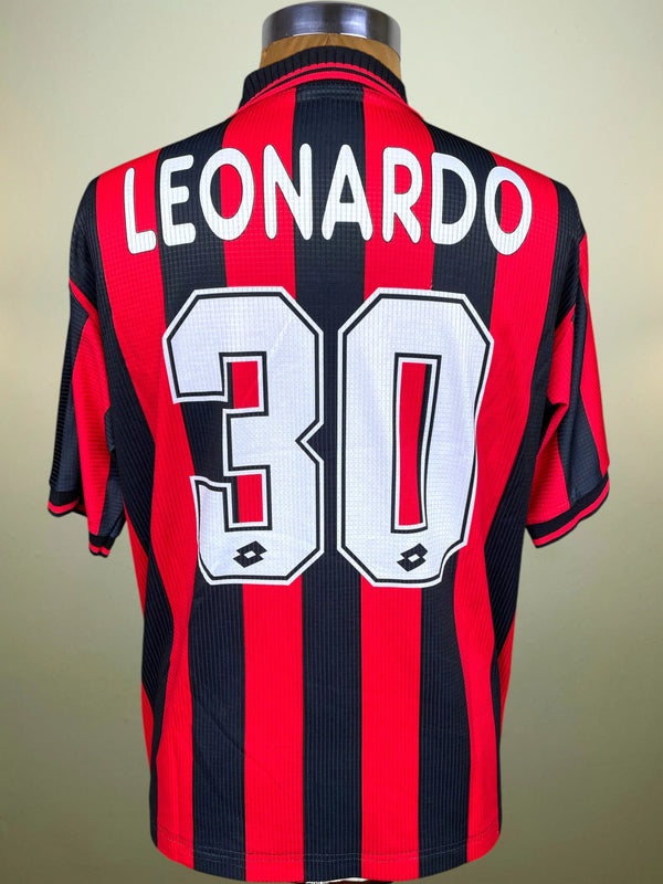 AC Milan red and back Home Shirt with the name "Leonardo" nd the number 30 printed into the fabric in white.