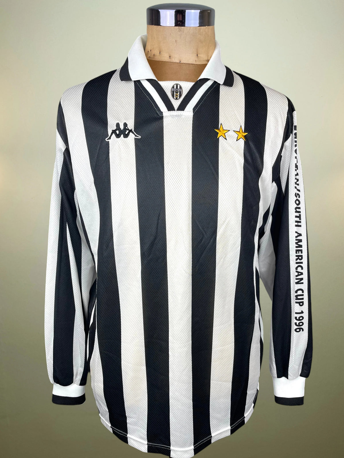 A vintage long-sleeve Juventus football jersey with black and white vertical stripes